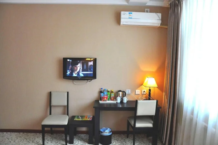 Далянь: Dalian Yijia Business Hotel