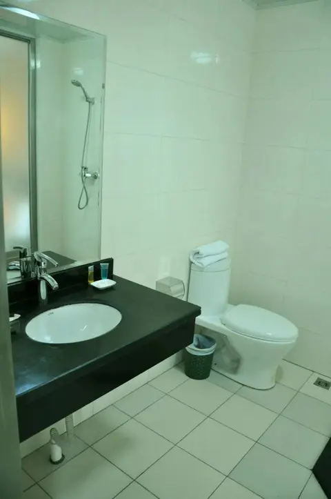 Далянь: Dalian Yijia Business Hotel