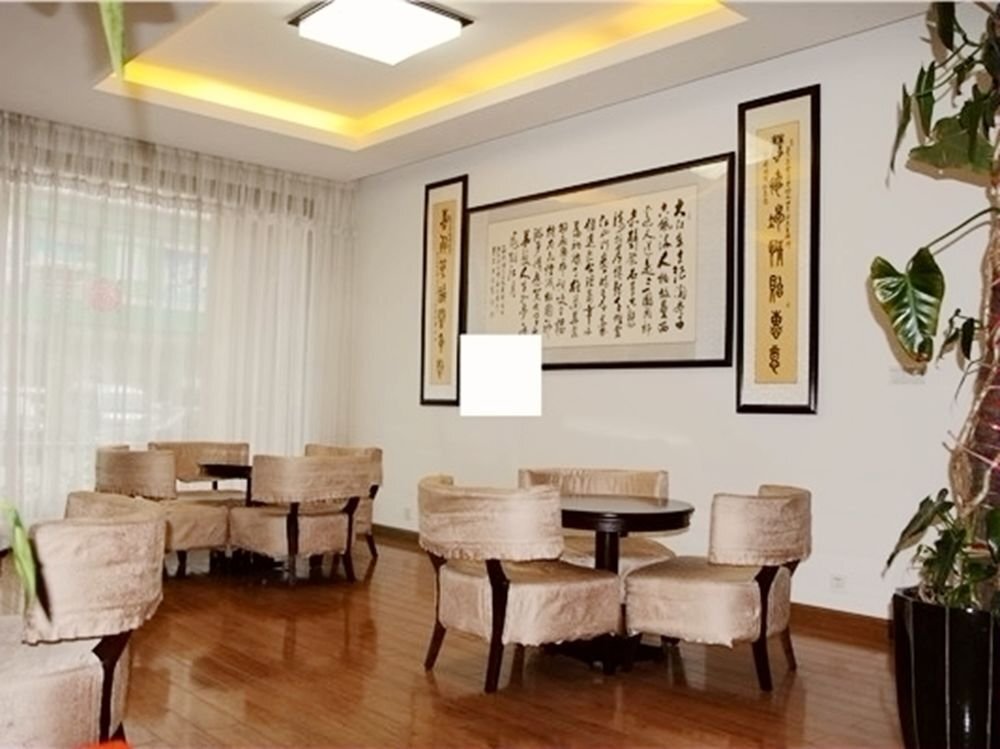 Циндао: Huijia Business Hotel - Qingdao