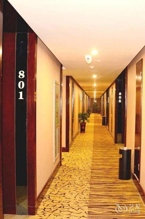 Синьян: Huangguan Business Hotel