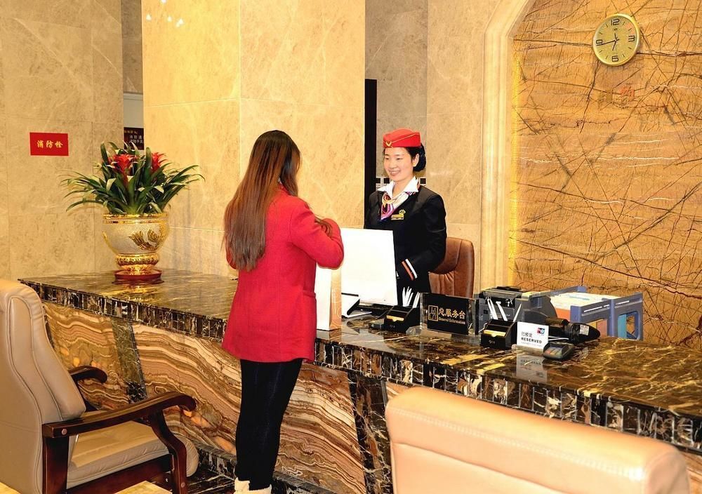 Синьян: Huangguan Business Hotel