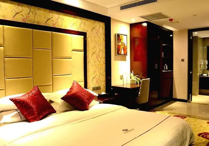 Синьян: Huangguan Business Hotel