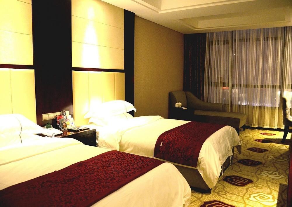 Синьян: Huangguan Business Hotel
