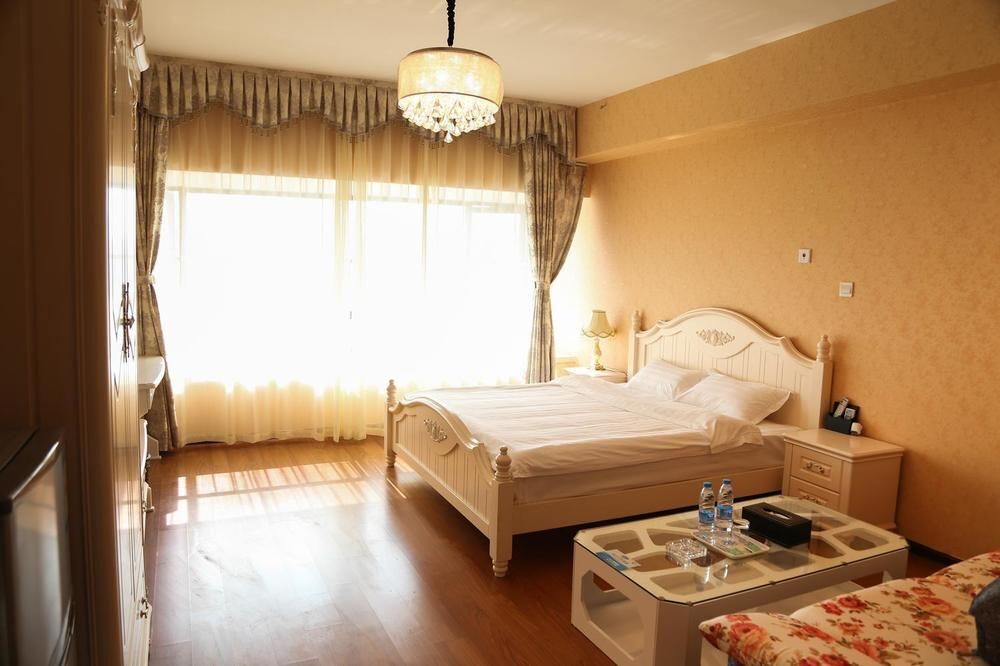 Уси: Wuxi Sovereign Service Apartments