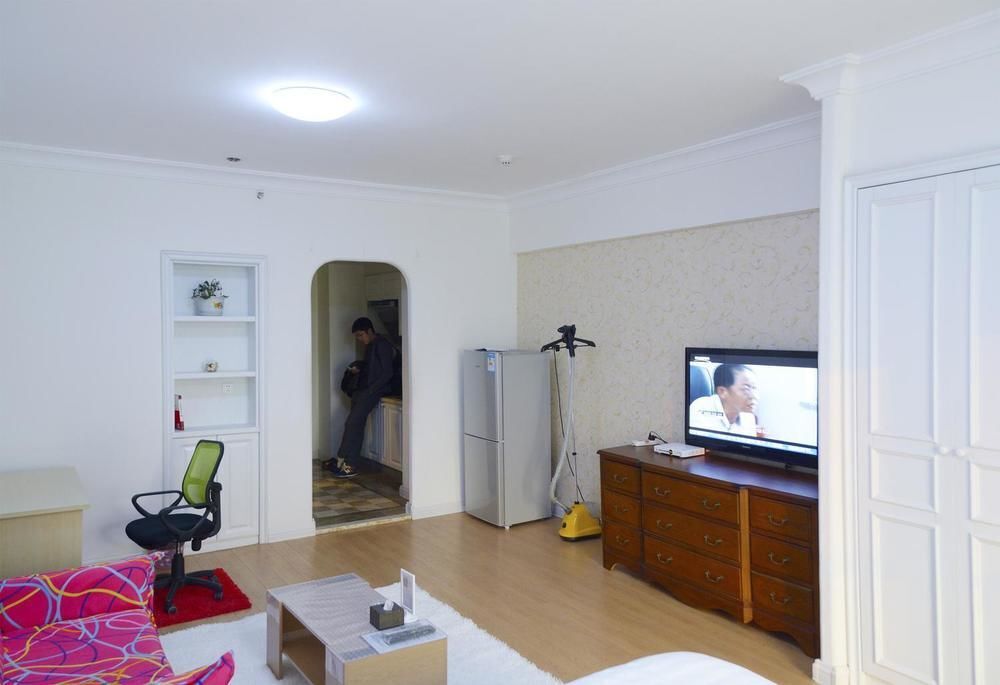 Далянь: Dalian Sanxing Mansion Starfish Hotel Apartment