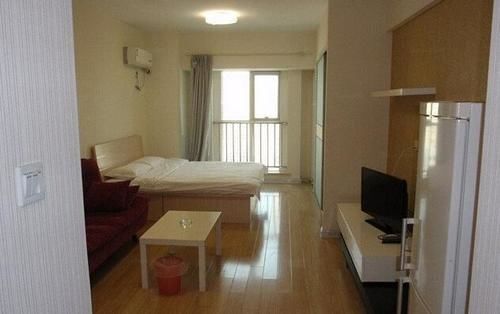 Далянь: Dalian Sanxing Mansion Starfish Hotel Apartment