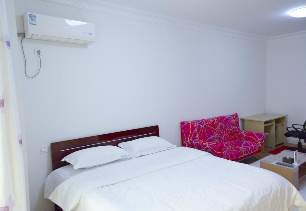 Далянь: Dalian Sanxing Mansion Starfish Hotel Apartment