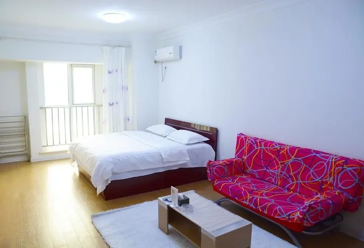 Далянь: Dalian Sanxing Mansion Starfish Hotel Apartment