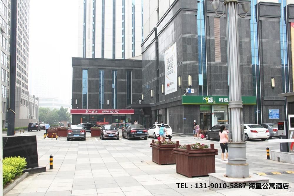 Далянь: Dalian Sanxing Mansion Starfish Hotel Apartment