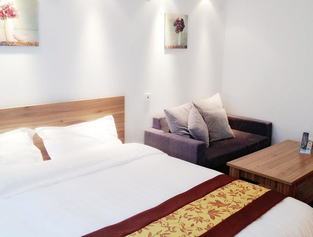 Циндао: Xianglishe Apartment Hotel