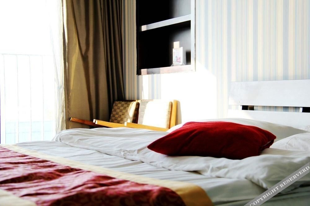Далянь: Enji Apartment Hotel Bainianhui - Dalian