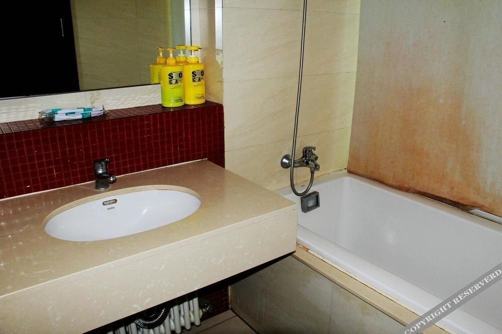 Далянь: Enji Apartment Hotel Bainianhui - Dalian