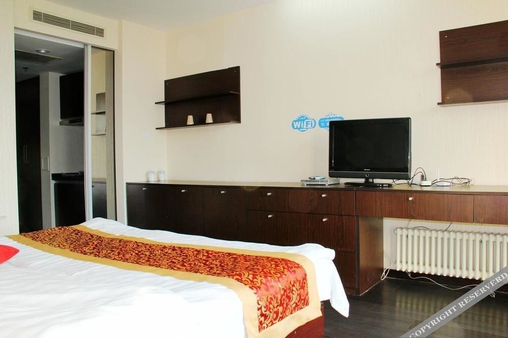 Далянь: Enji Apartment Hotel Bainianhui - Dalian