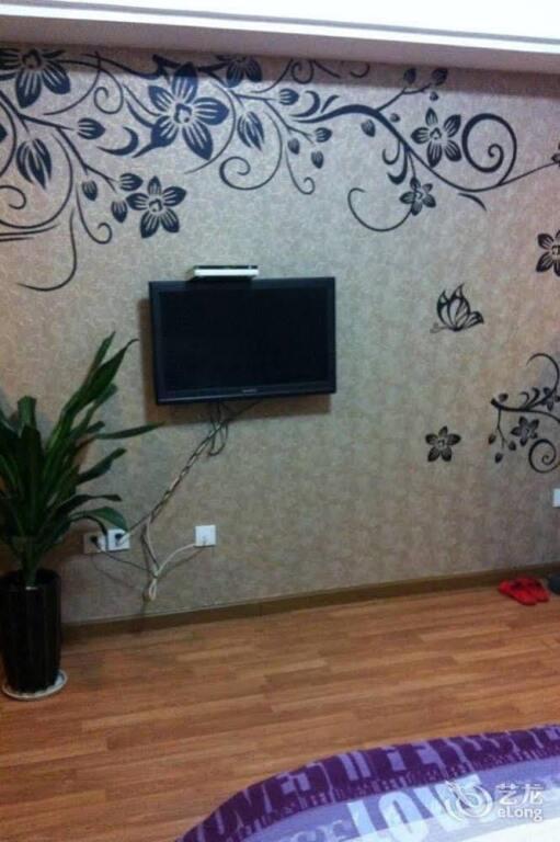 Zhenjiang Jingwei Hotel Apartment — фото 4