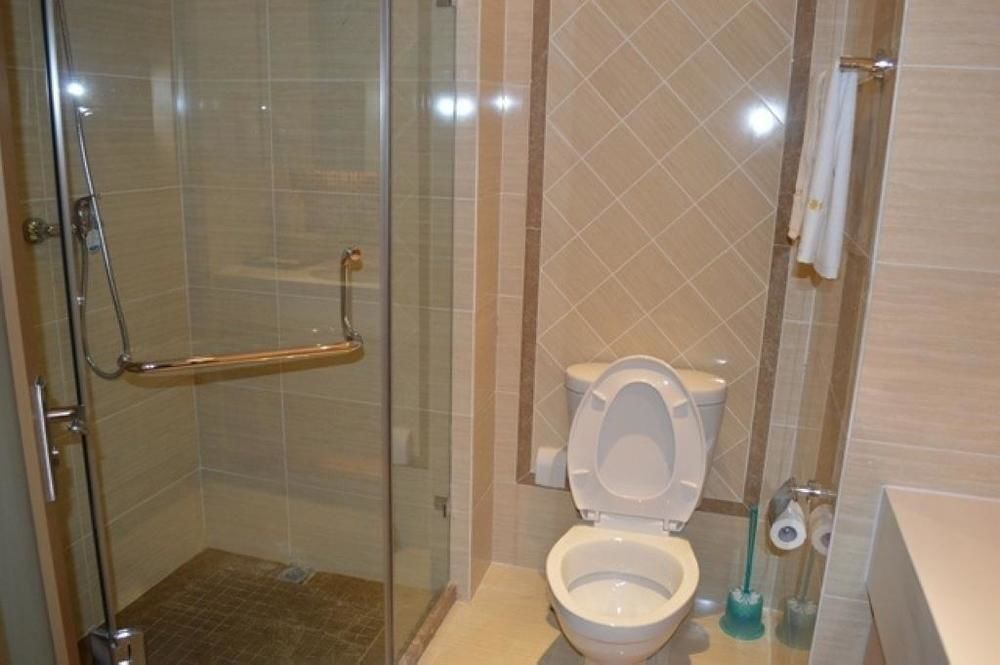Далянь: Dalian Sea View Deluxe Apartment-wanda Plaza