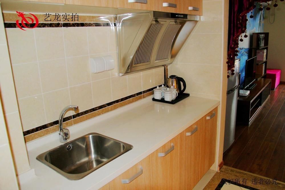 Далянь: Dalian Sea View Deluxe Apartment-wanda Plaza