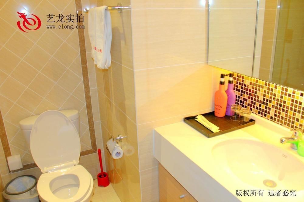 Далянь: Dalian Sea View Deluxe Apartment-wanda Plaza