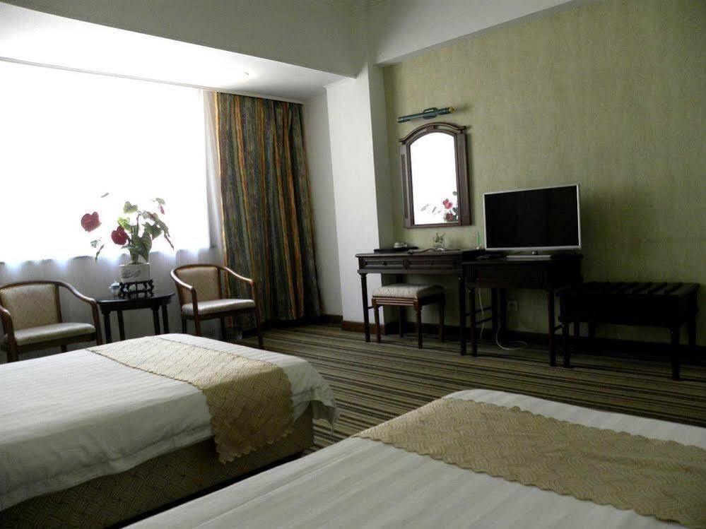 Далянь: Jianxing Business Hotel - Dalian