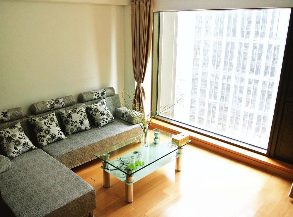 Циндао: Qingdao Lewo Boutique Apartment
