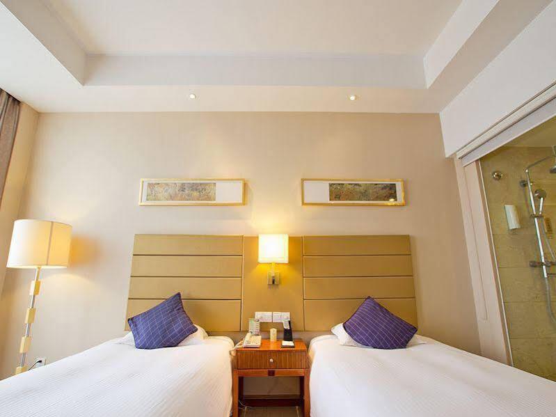 Цзинань: Jinan Zhangqiu Inzone Garland Hotel