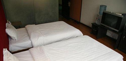 Циндао: Huiheju Business Hotel - Tsingtao