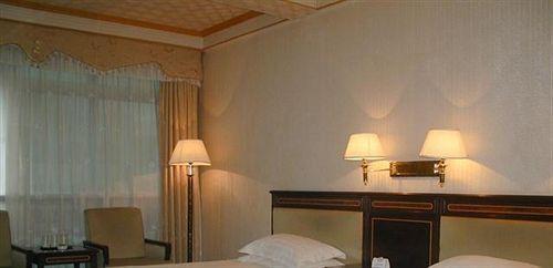 Наньтун: Qidong Xingdu Hotel