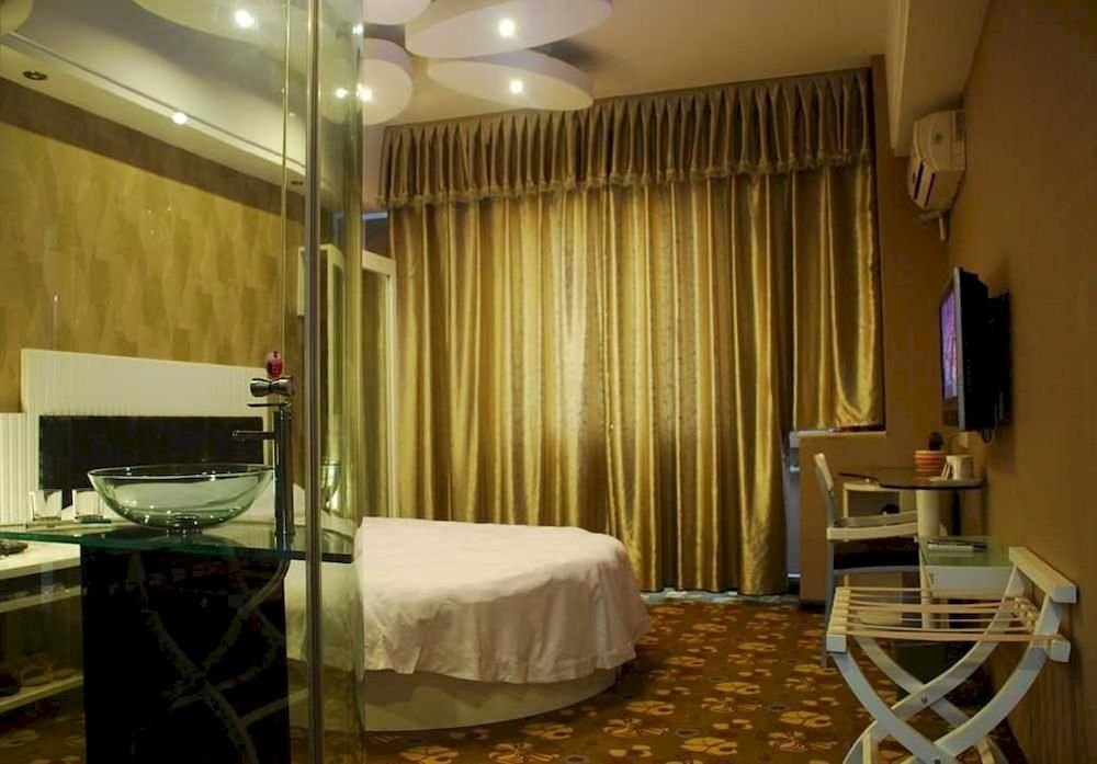 Чжэнчжоу: Nine Days Fashion Hotel Zhengzhou China World Trade Center 360 Square