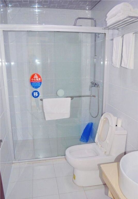 Чжэньцзян: Xingainian Business Hotel