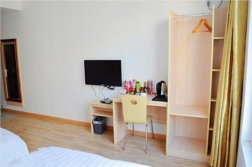 Чжэньцзян: Xingainian Business Hotel