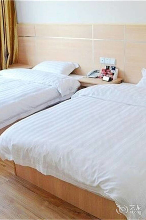 Чжэньцзян: Xingainian Business Hotel
