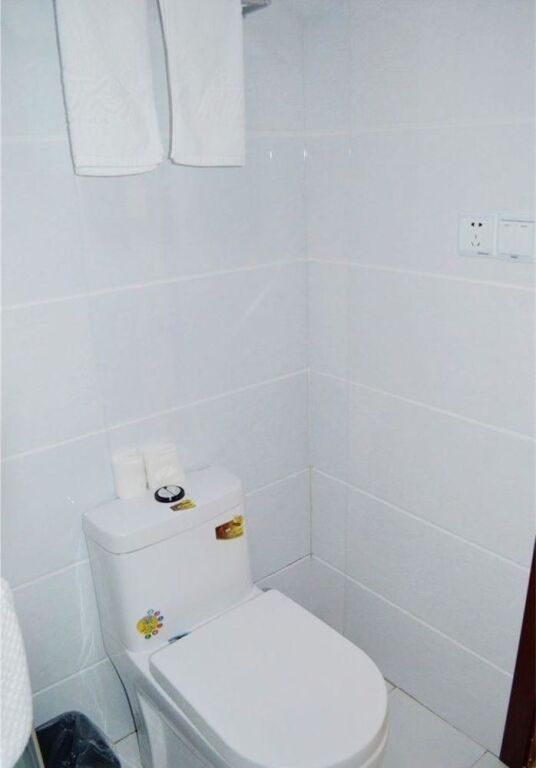 Чжэньцзян: Xingainian Business Hotel