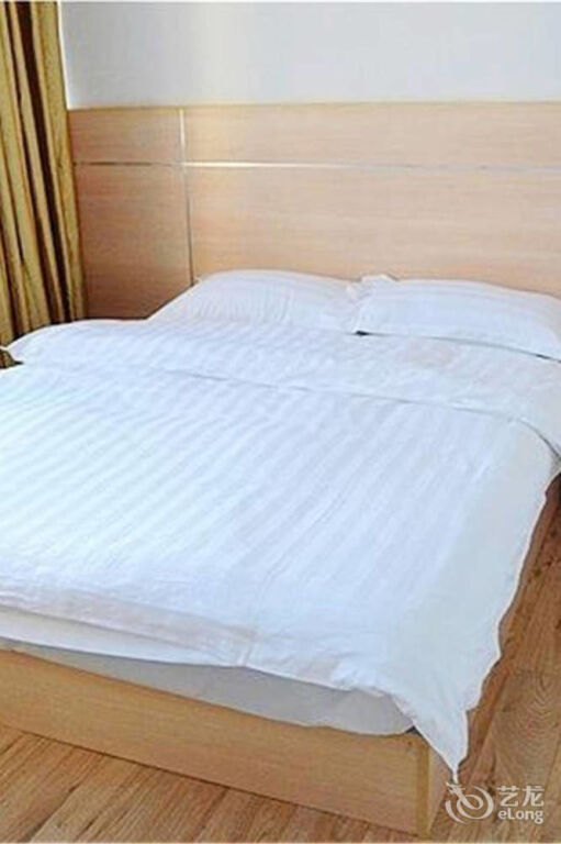 Чжэньцзян: Xingainian Business Hotel