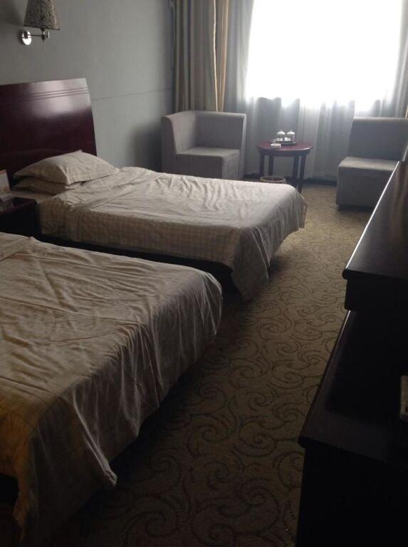 Синьян: Xinyang Tianyi Express Hotel