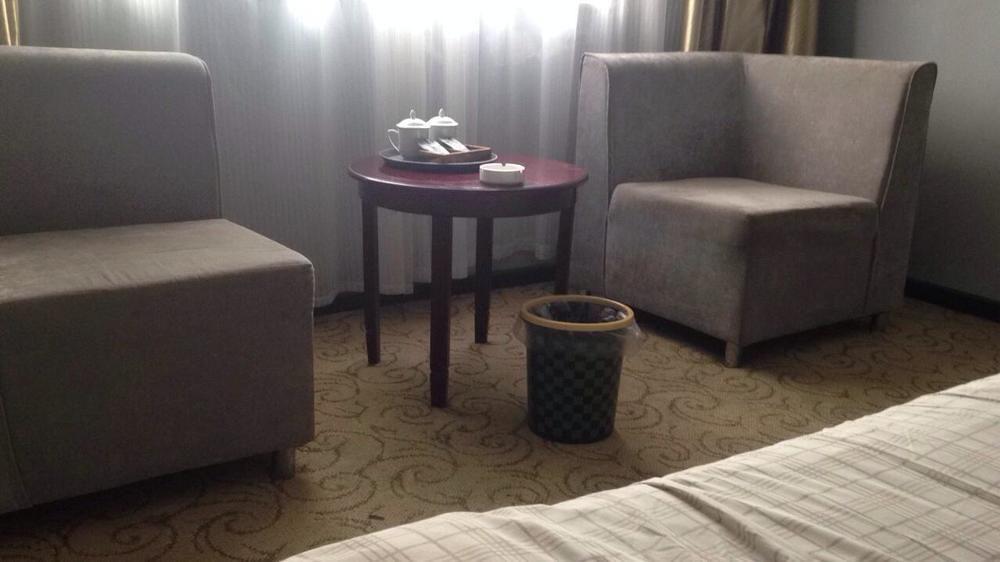 Синьян: Xinyang Tianyi Express Hotel