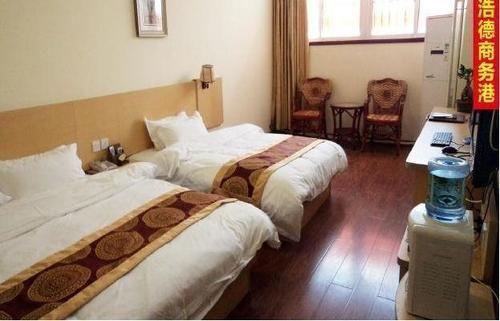 Цзинин: Qufu Shuanglong Business Hotel