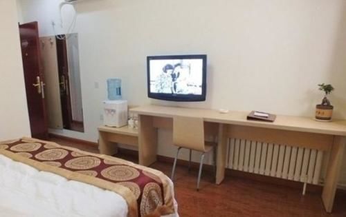 Цзинин: Qufu Shuanglong Business Hotel