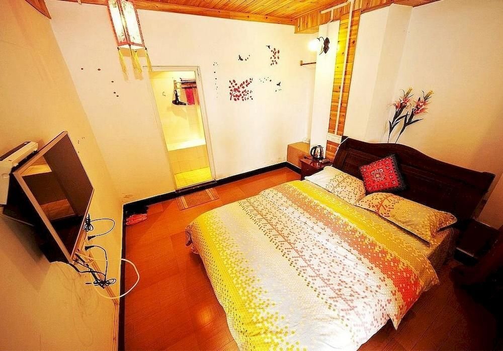 Лицзян: Lijiang Caicaijia Inn