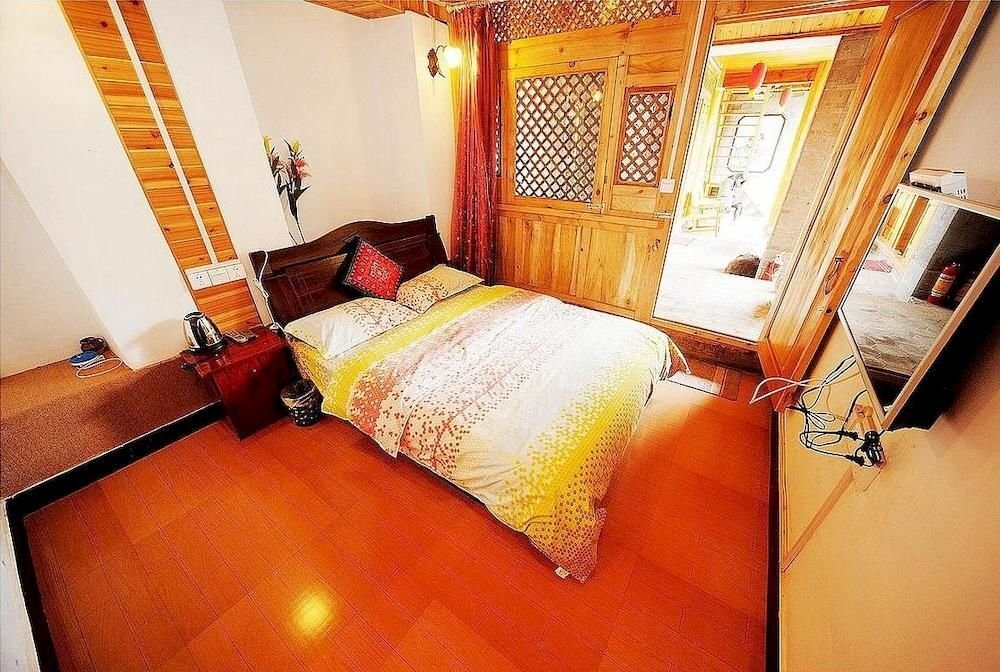 Лицзян: Lijiang Caicaijia Inn