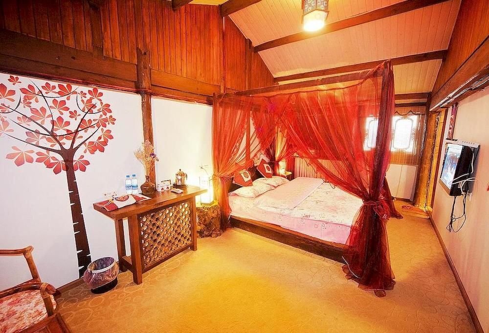 Лицзян: Lijiang Caicaijia Inn