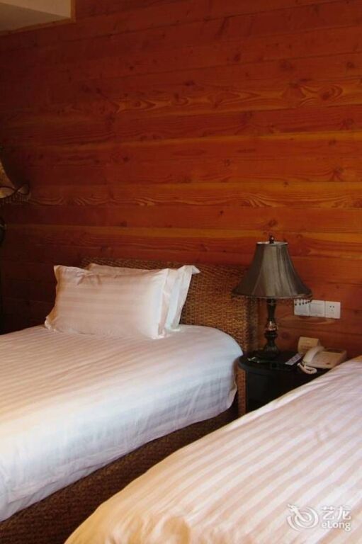 Чжоушань: Feichengwurao Resort