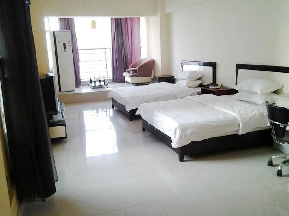 Наньнин: Taohuayuan Apartment Hotel- Nanning