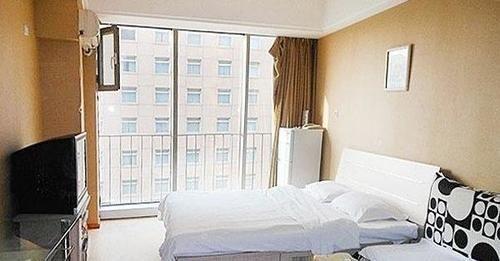 Далянь: Dalian Jinchen International Hotel Apartments