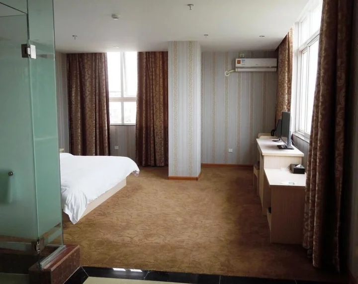 Наньнин: Jiangyuan Business Hotel