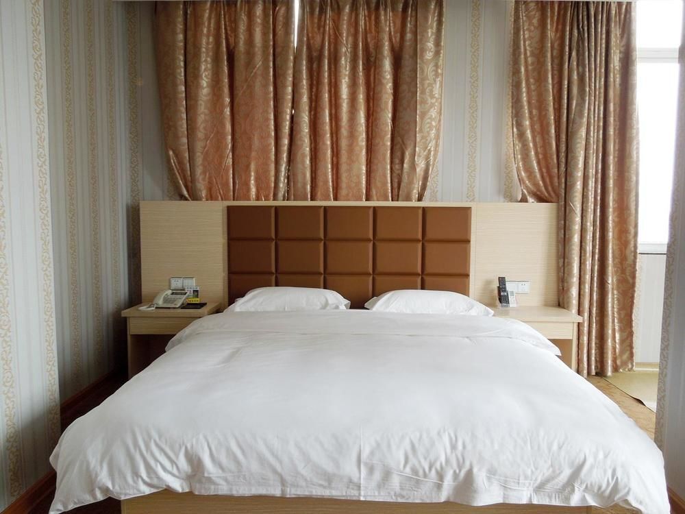 Наньнин: Jiangyuan Business Hotel