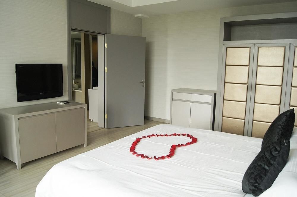 Жичжао: Century Sailboat Apartment Hotel