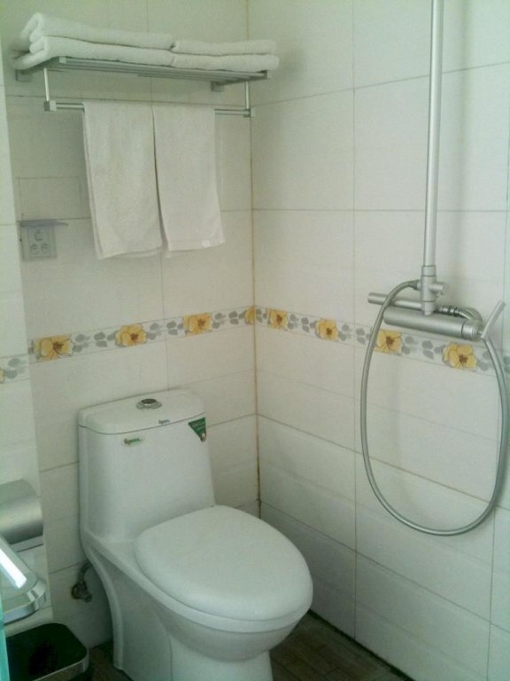 Дунъин: Shijia Business Hotel