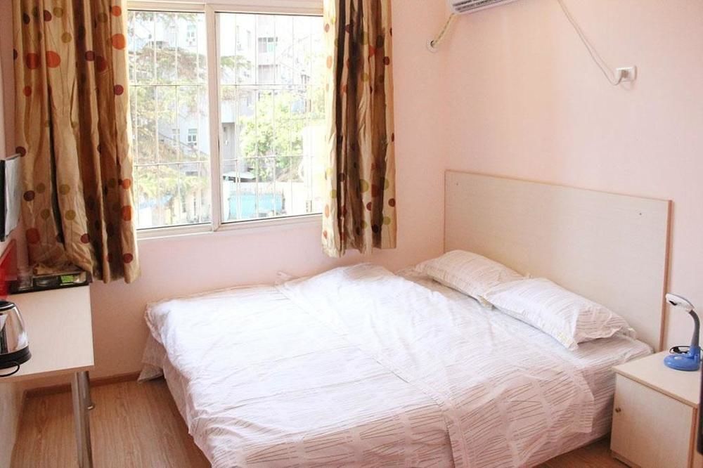 Ухань: Wuhan Bingo Apartment
