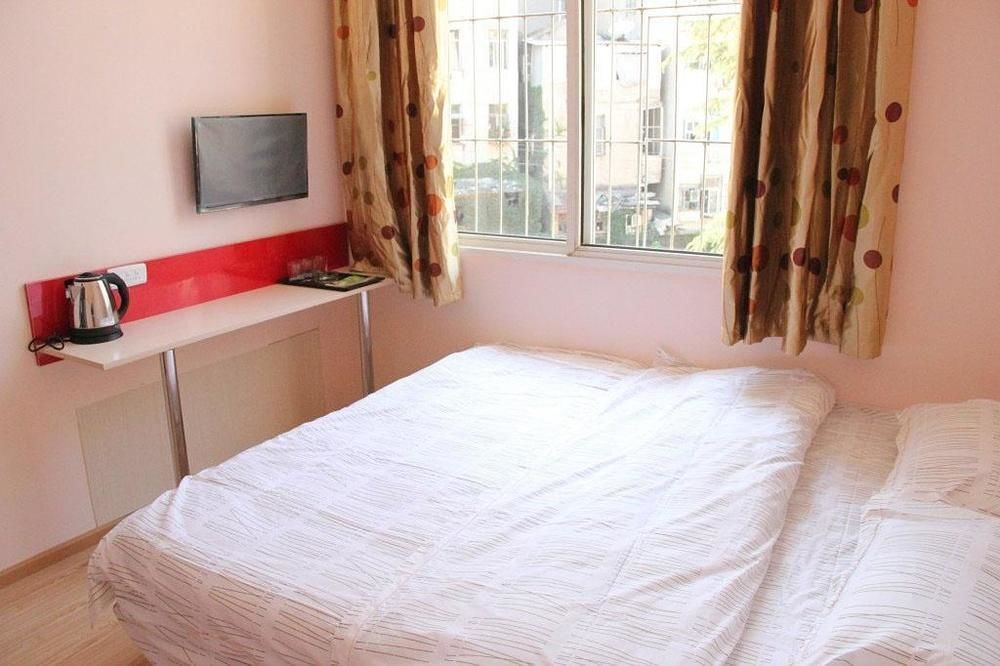 Ухань: Wuhan Bingo Apartment