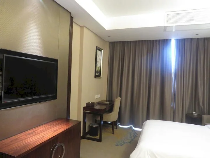 Дэян: Totem Impress Hotel