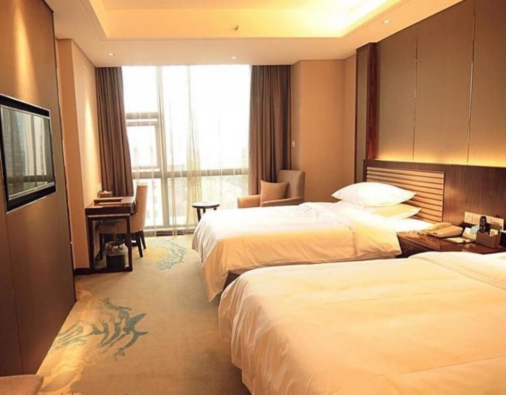 Дэян: Totem Impress Hotel